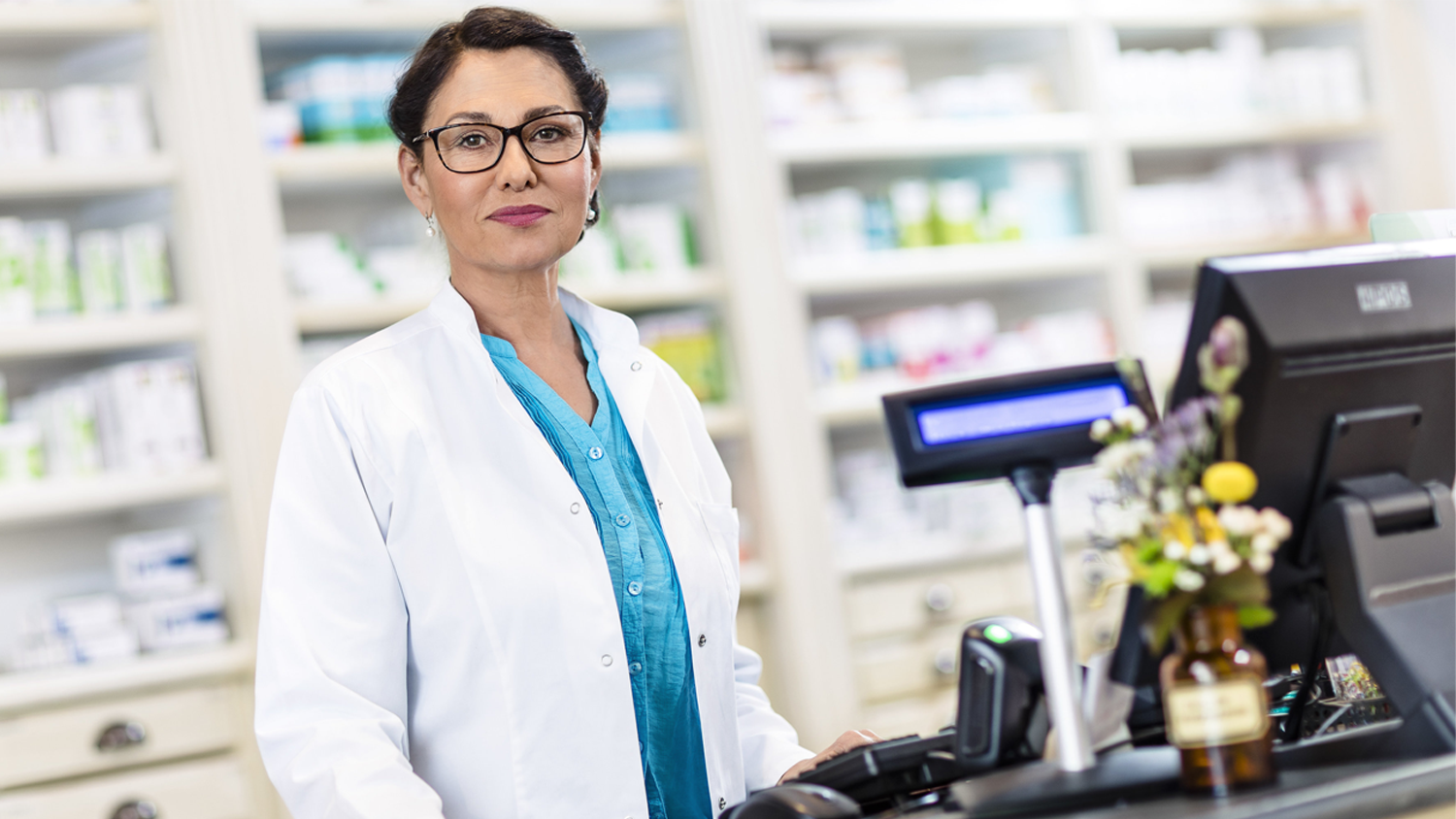 Apothekerin am HV-Tisch